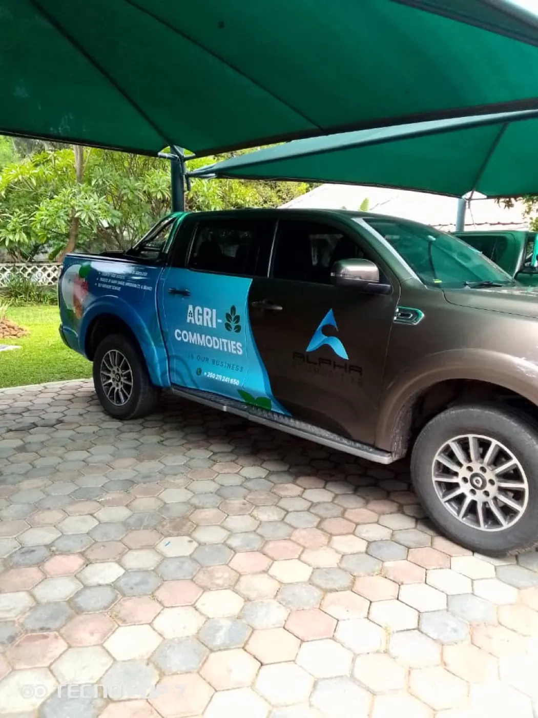 Agri Commodities pickup with branded vehicle wrap