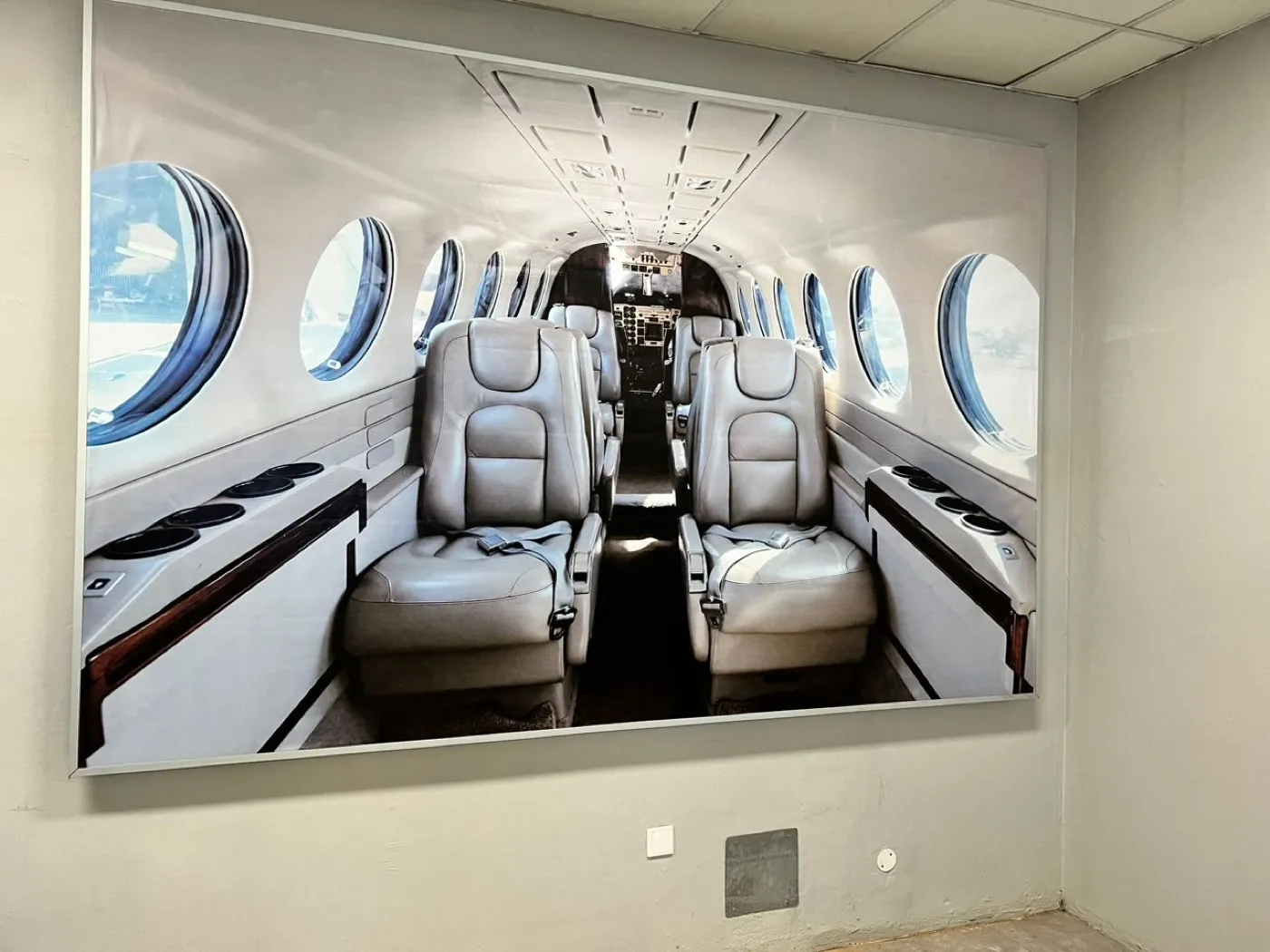 Wall graphic of an aircraft cabin interior