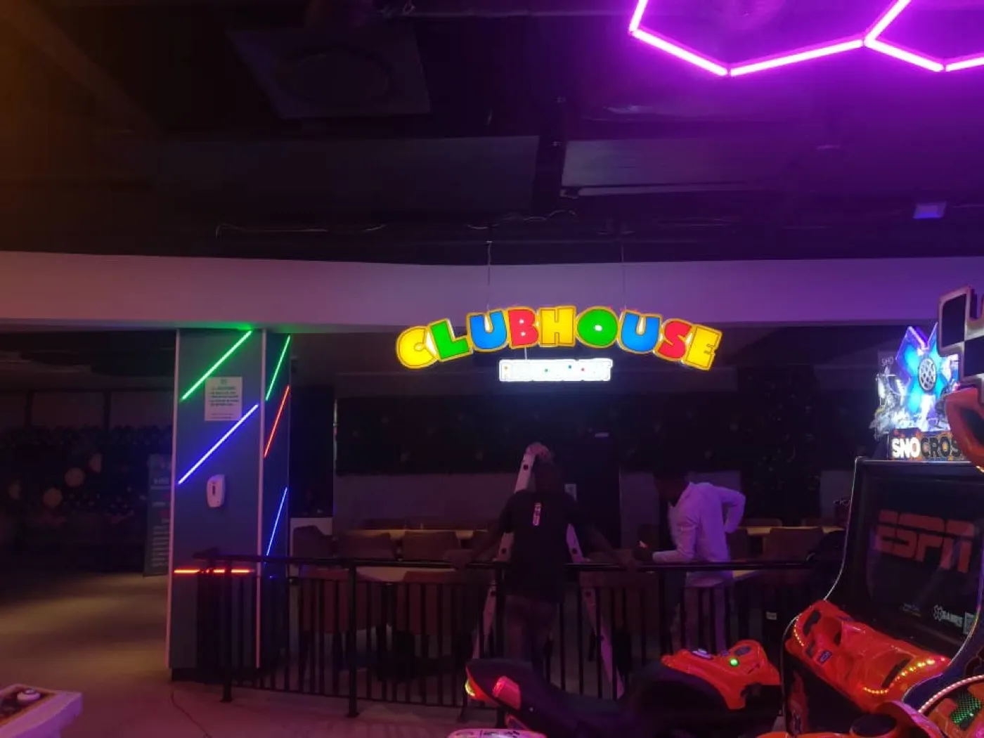 Colourful Clubhouse interior sign with neon lighting